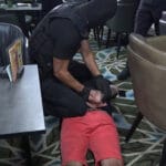 hapsenje-policija-muskarac-na-podu